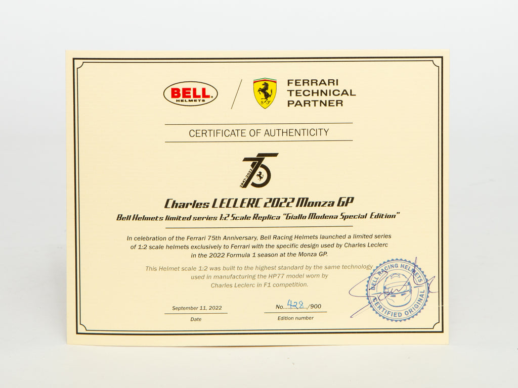 Certificate of Authenticity for a Ferrari racing helmet with Bell and Ferrari logos.